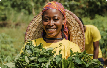 A Farmer holding vegetable