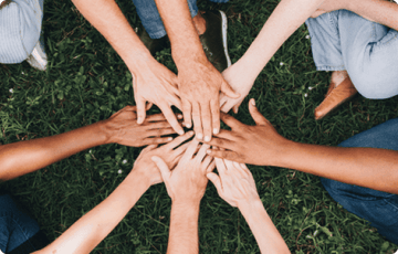 Diverse hands joined in unity